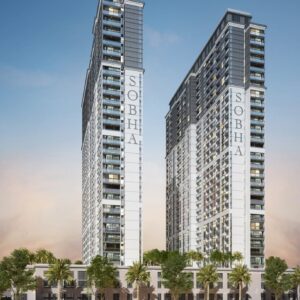 Two modern high-rise residential towers with balconies and glass facades