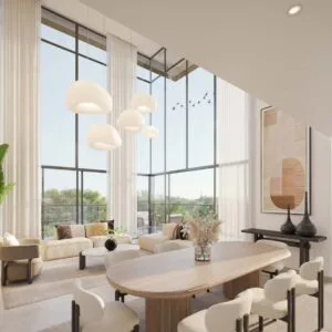 Bright modern living and dining area with large windows and balcony