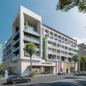 Modern multi-story residential building with balconies and palm trees
