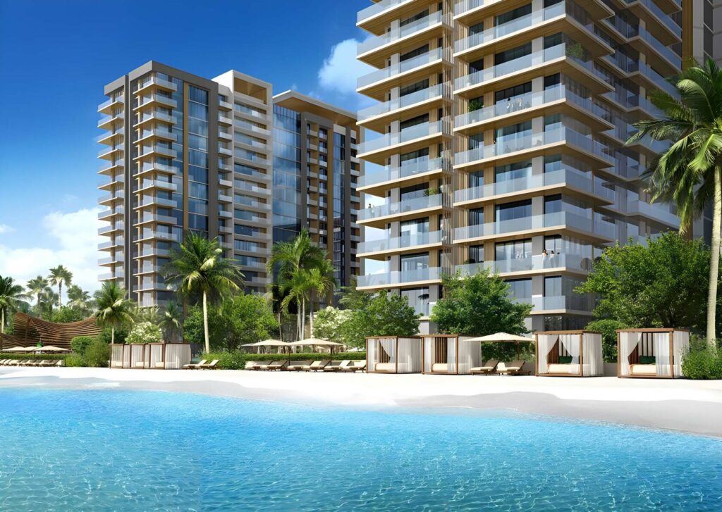 Modern residential buildings with balconies by a beach and palm trees