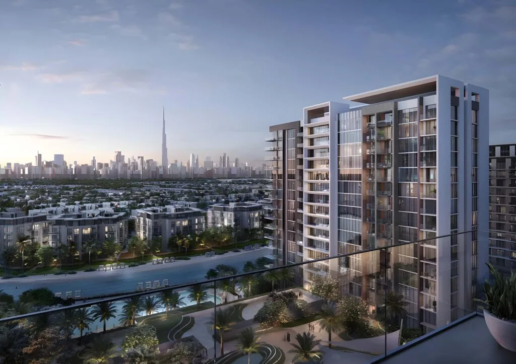 Modern residential building with city skyline and Burj Khalifa in background