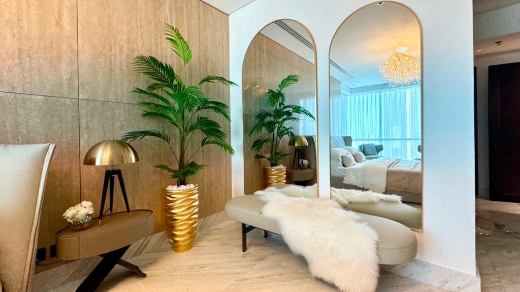 Interior detail with large mirrors and decorative plants in Al Fattan Marine Towers Dubai Marina unit for sale