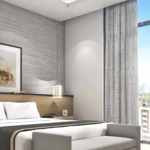 Спальня с кроватью и балконом в апартаментах Sobha Creek Vistas Heights Tower B Sobha Hartland Dubai