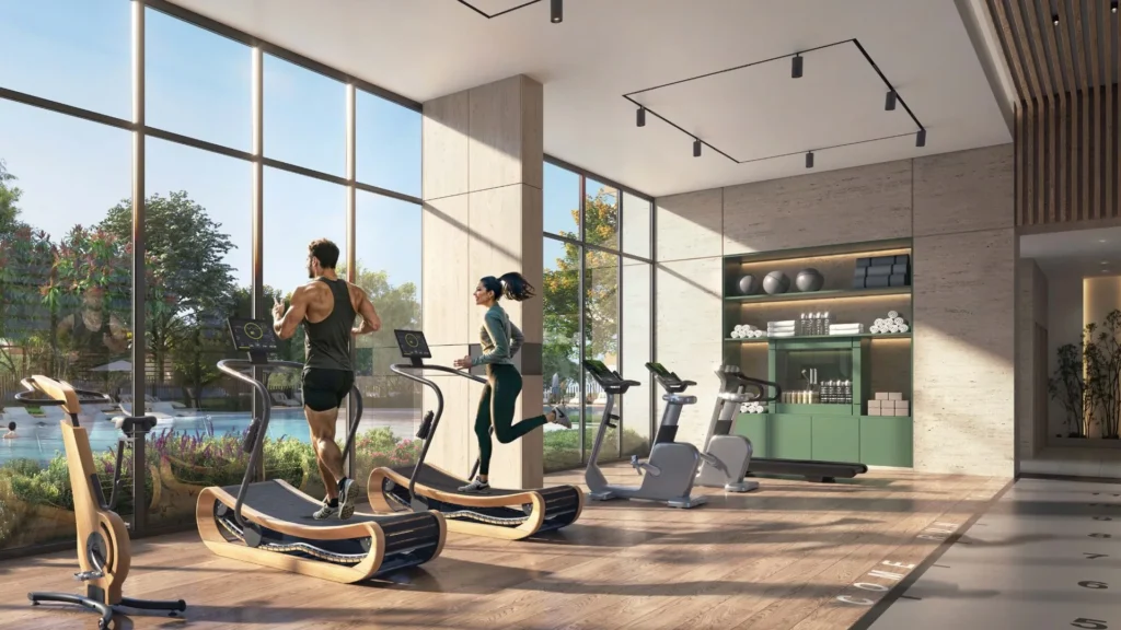 Gym interior with treadmills and exercise bikes at Ghaf Woods DubaiLand Dubai