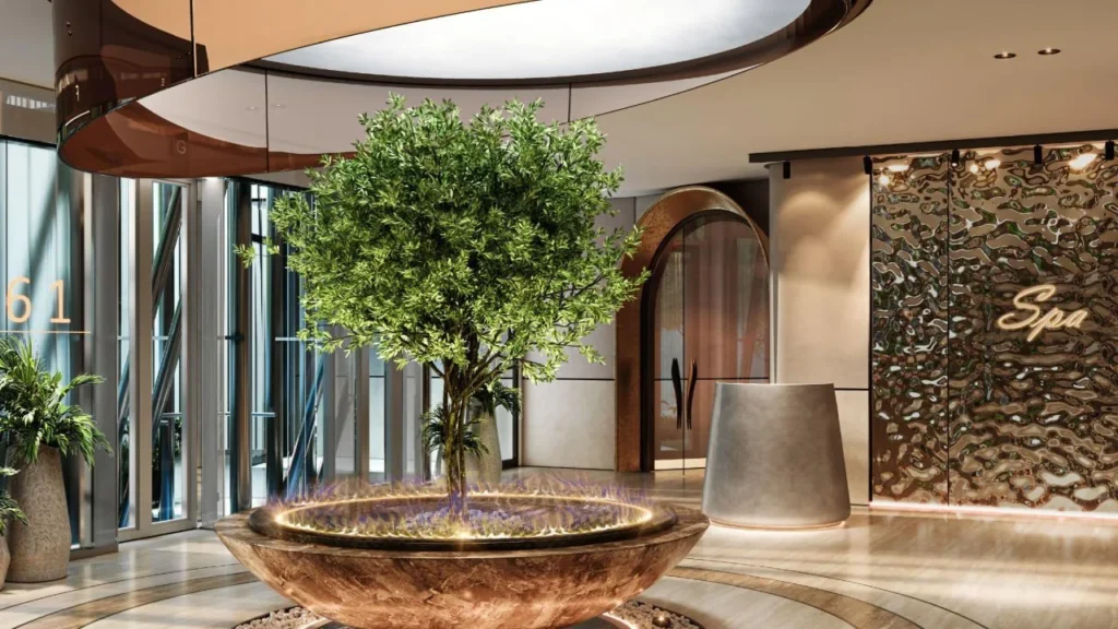 Lobby interior with central tree and spa entrance at Ciel Vignette Collection Dubai Marina Dubai