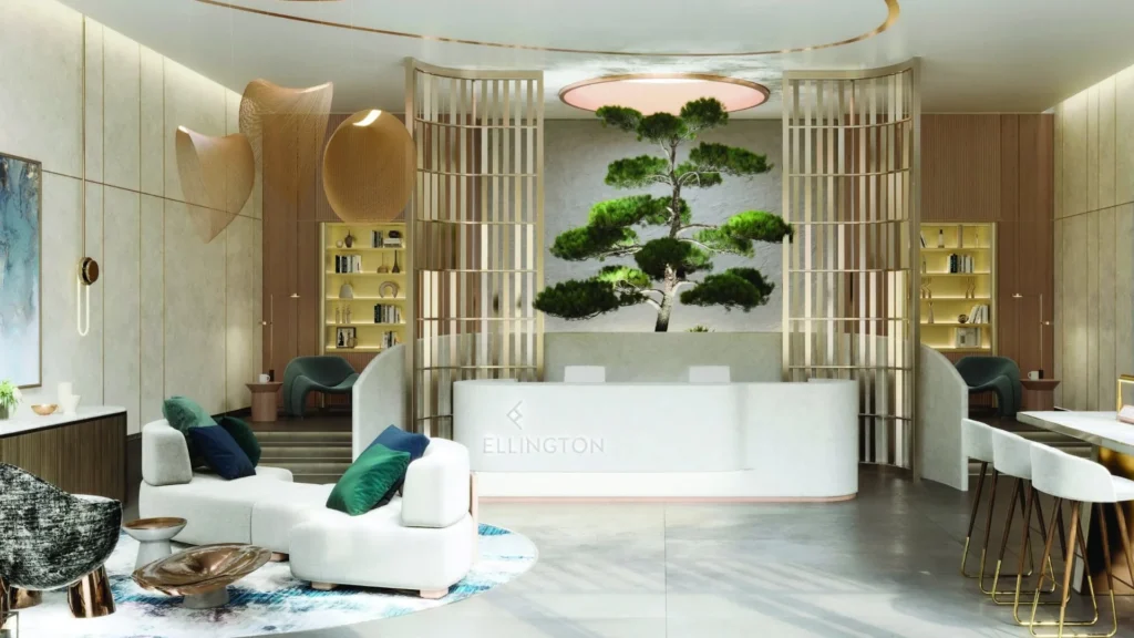 Reception area with seating and decorative tree at Crestmark Business Bay Dubai
