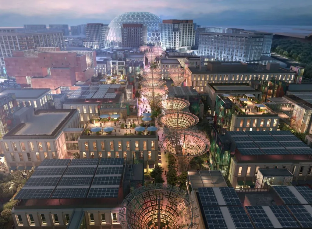 Aerial view of modern buildings with glass canopies and dome structure