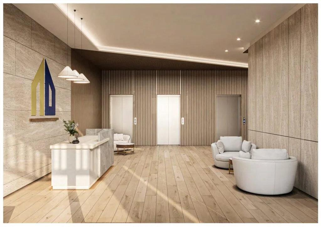 Lobby area with reception desk and three elevators