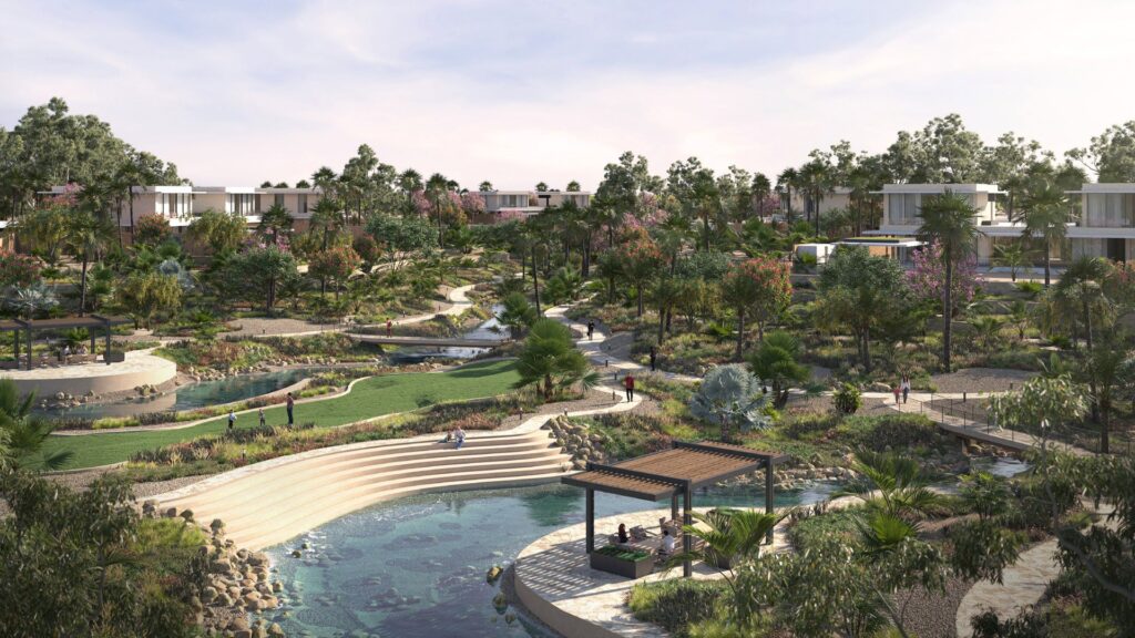 landscaped park area with water features and modern buildings