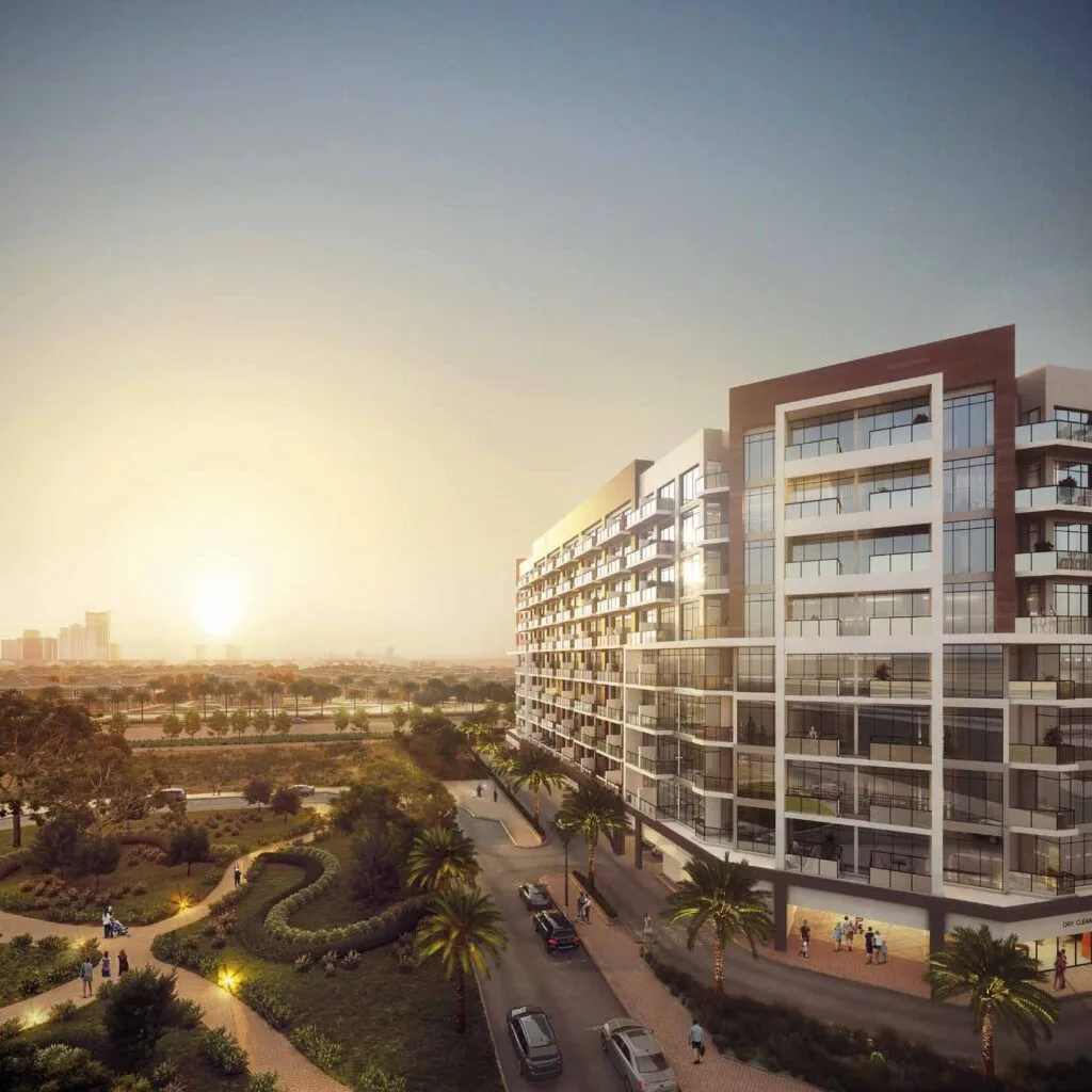 Exterior view of mid-rise residential building at sunset