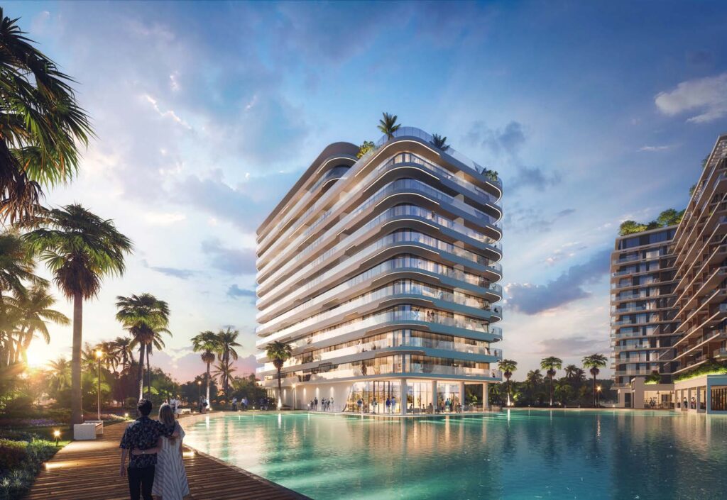 Azizi Venice 6 — Главный корпус у бассейна и пальм
