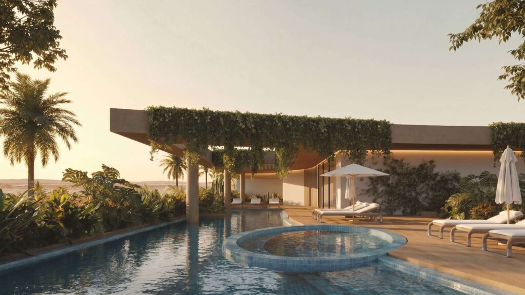 Outdoor pool area with lounge chairs and shaded terrace
