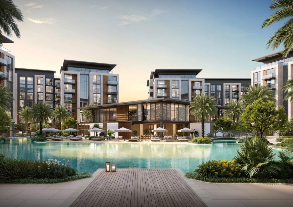 Exterior view of residential buildings with large pool and palm trees