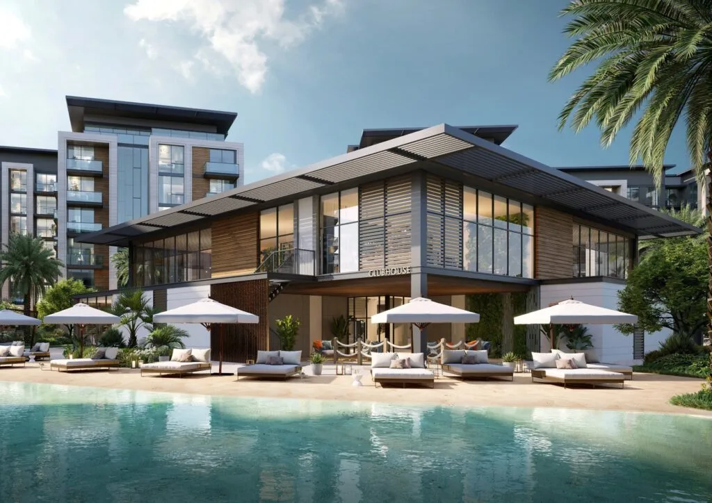 Modern clubhouse building with pool and sun loungers