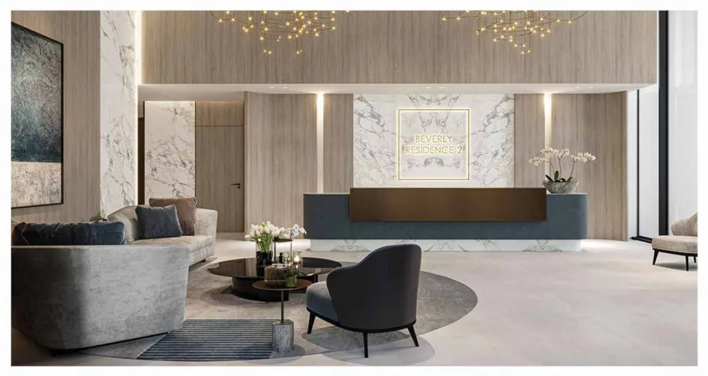 Modern reception area with seating and marble wall panels
