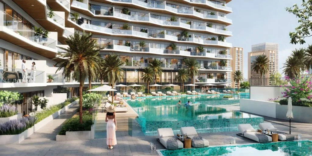 Exterior view of residential building with pool and palm trees