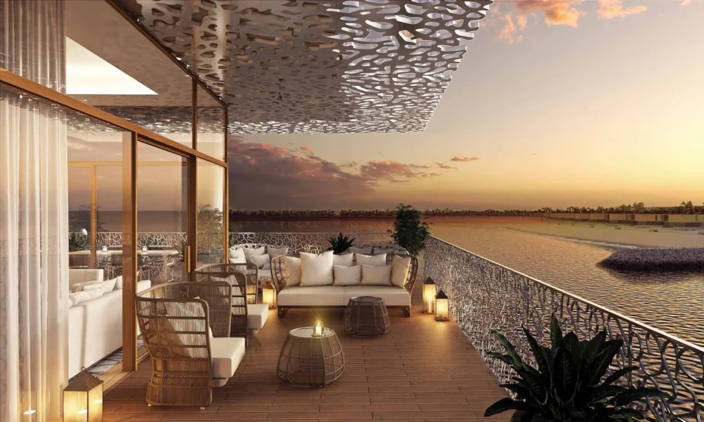 Residence terrace with lounge seating, perforated canopy and sunset sea view (developer rendering)