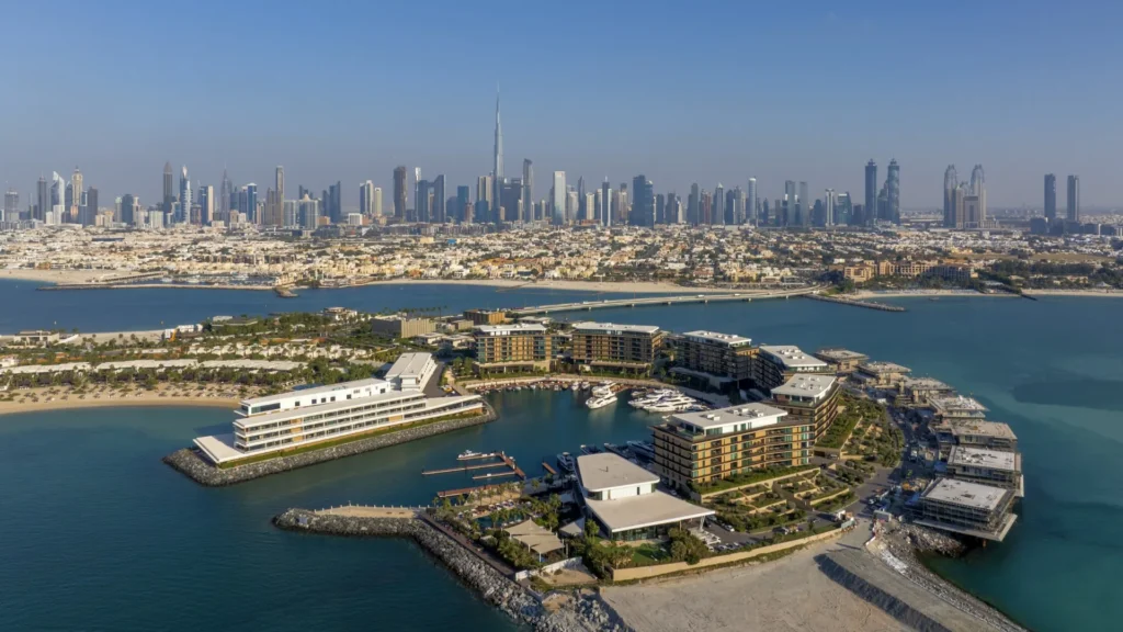 Aerial view of Jumeirah Bay Island and the Dubai skyline across the water
