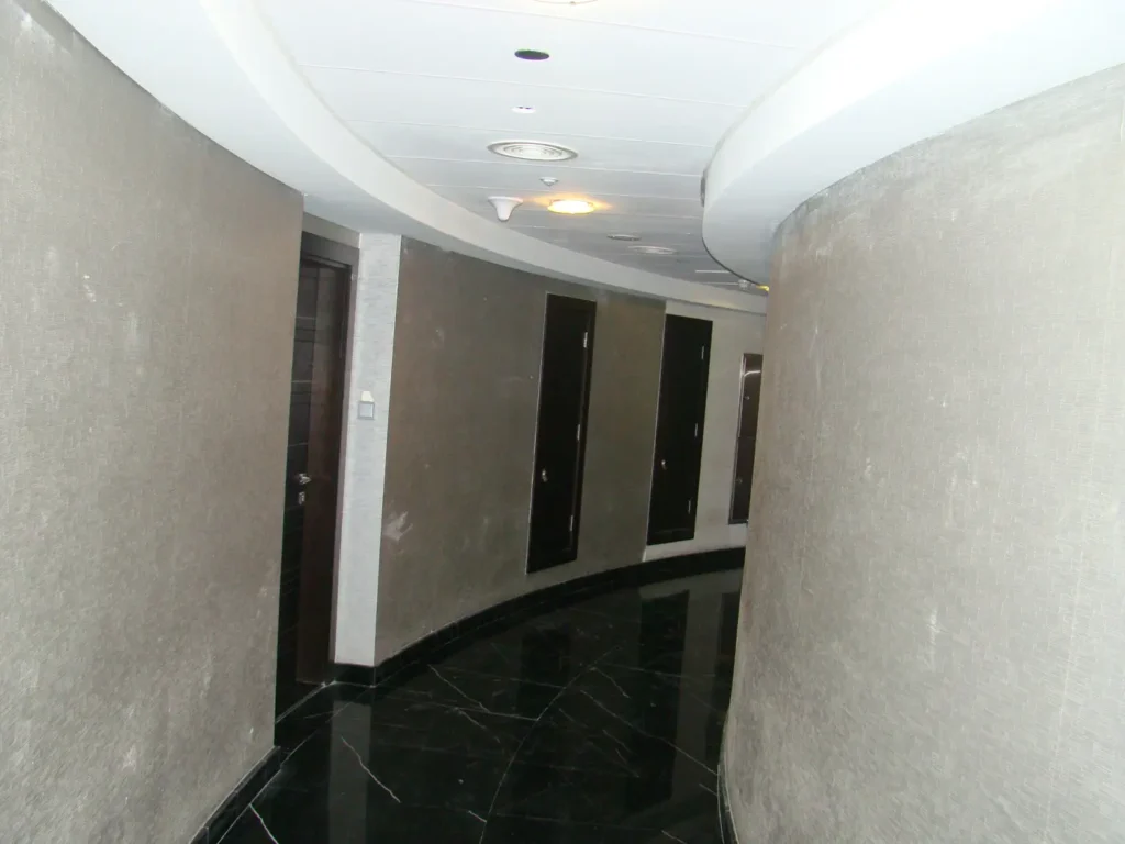 curved residential corridor, Cayan Tower, Dubai Marina, Dubai