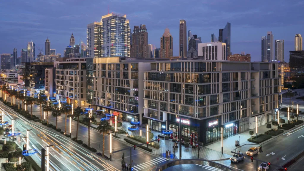 City Walk urban district at dusk with residential buildings and downtown Dubai skyline