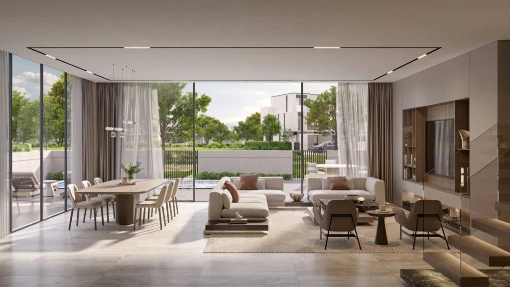 Modern living and dining area with large glass windows