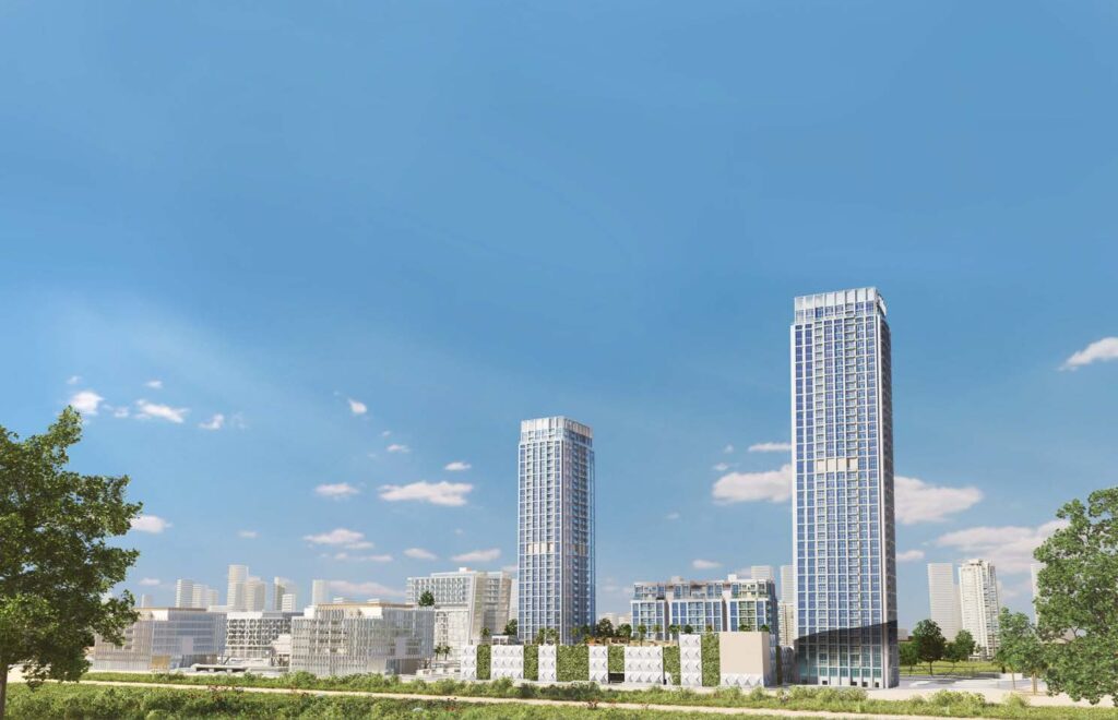 Two tall residential towers with animated characters and blue sky