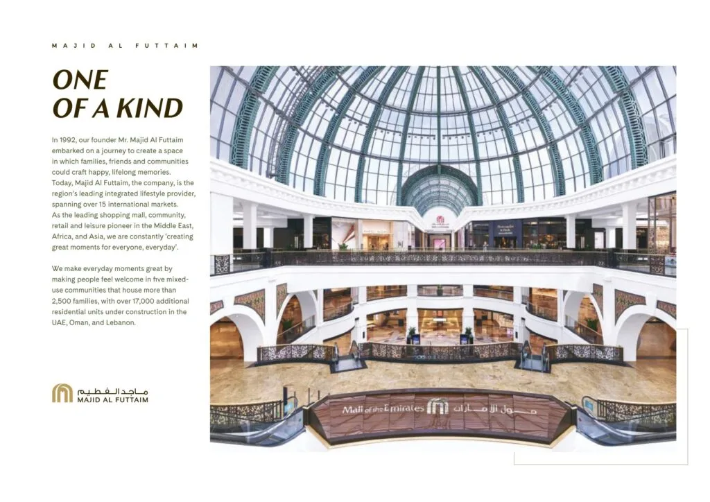 Interior view of a large shopping mall with glass dome ceiling