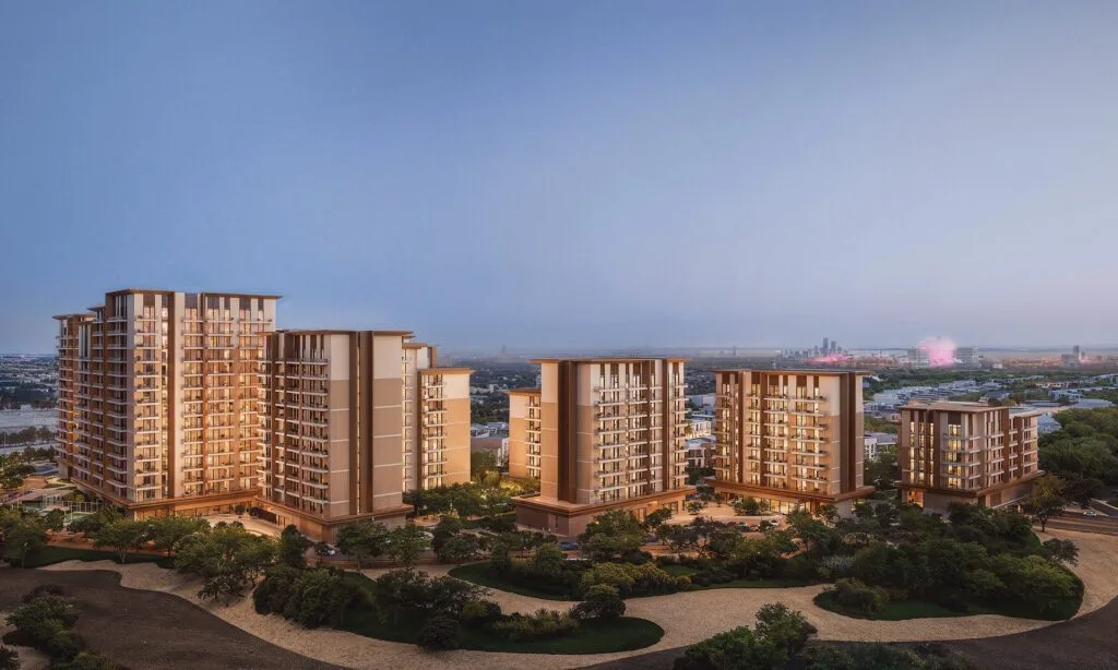 Exterior view of multi-story residential buildings with landscaped grounds