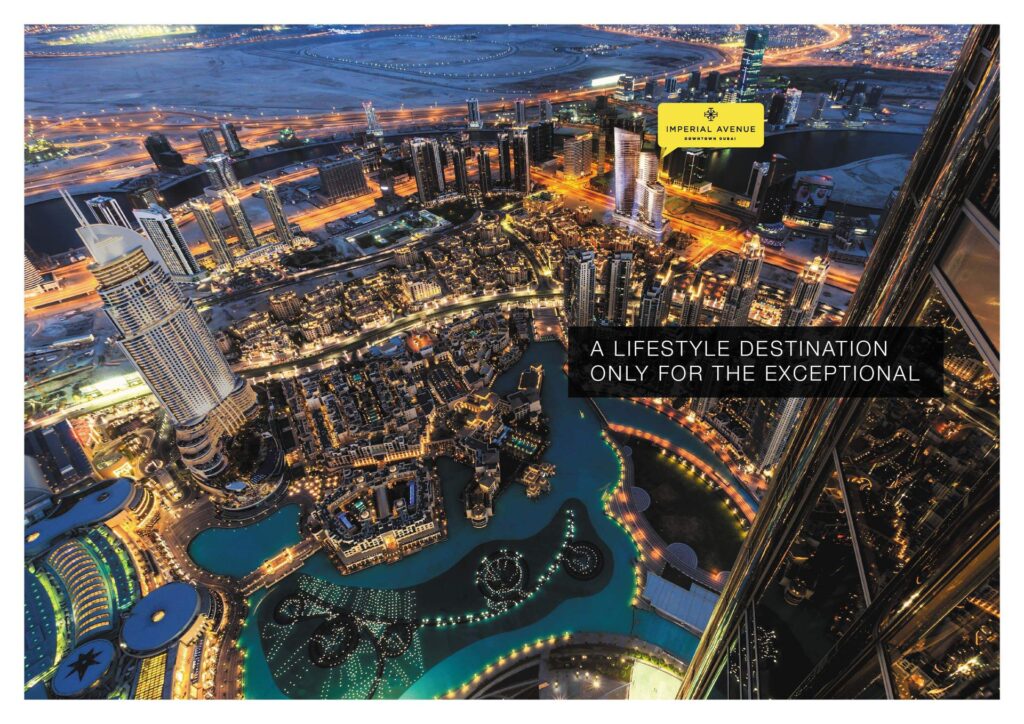 Aerial night view of Dubai cityscape with illuminated buildings and waterways