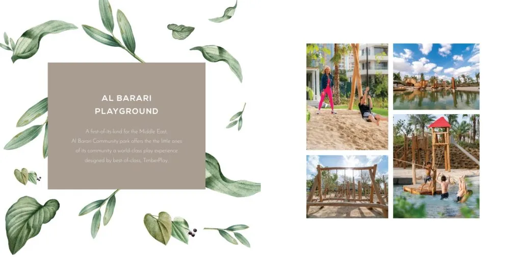 Outdoor playground with wooden play structures and greenery