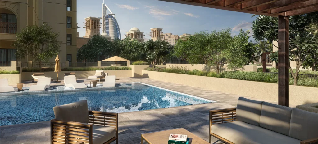 Jadeel at Madinat Jumeirah Living by Meraas in Madinat Jumeirah Living, Dubai — Residential pool terrace with landscaped gardens and skyline