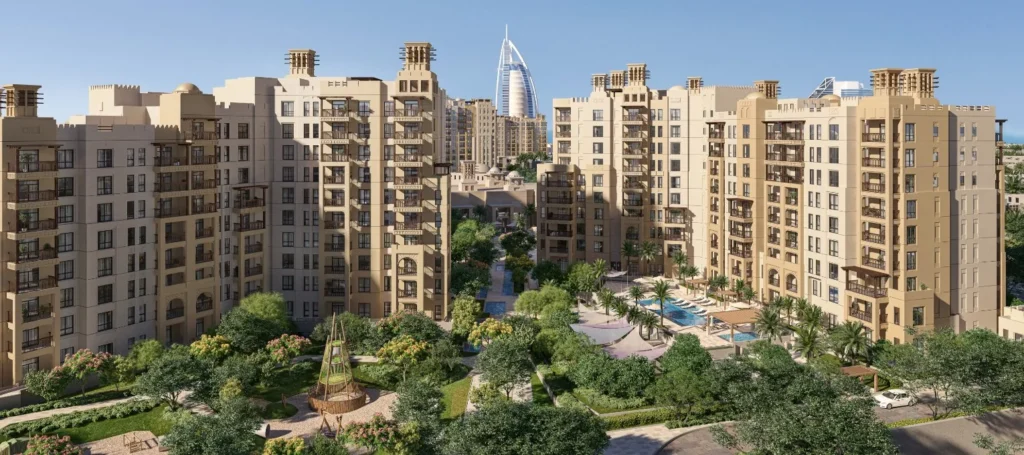 Jadeel by Meraas in Madinat Jumeirah Living, Dubai — Bird’s-eye view of landscaped residential community and Burj Al Arab