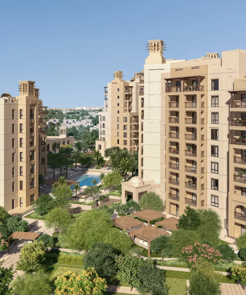 Jadeel by Meraas in Madinat Jumeirah Living, Dubai — Residential buildings surrounding landscaped gardens and swimming pool