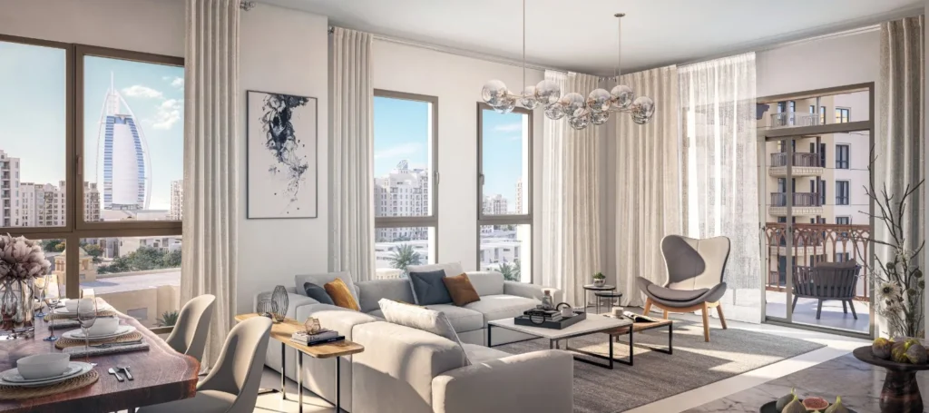 Jadeel by Meraas in Madinat Jumeirah Living, Dubai — Bright furnished living room with city landmark views