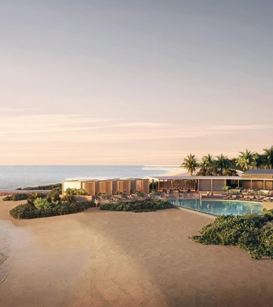 Exterior view of pool and low-rise buildings by the sea