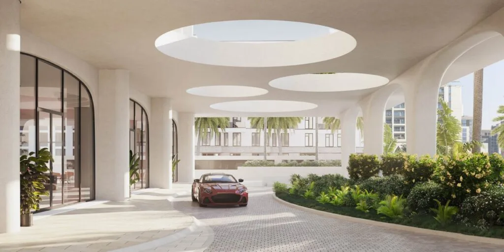 Koro One covered drop-off entrance with landscaping