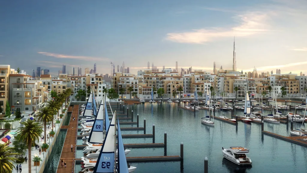 Port de La Mer marina with floating docks, residential buildings and the Dubai skyline (developer rendering)