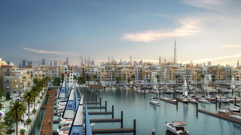 Panoramic view of La Cote residential buildings and marina with Burj Khalifa on the skyline (developer rendering)