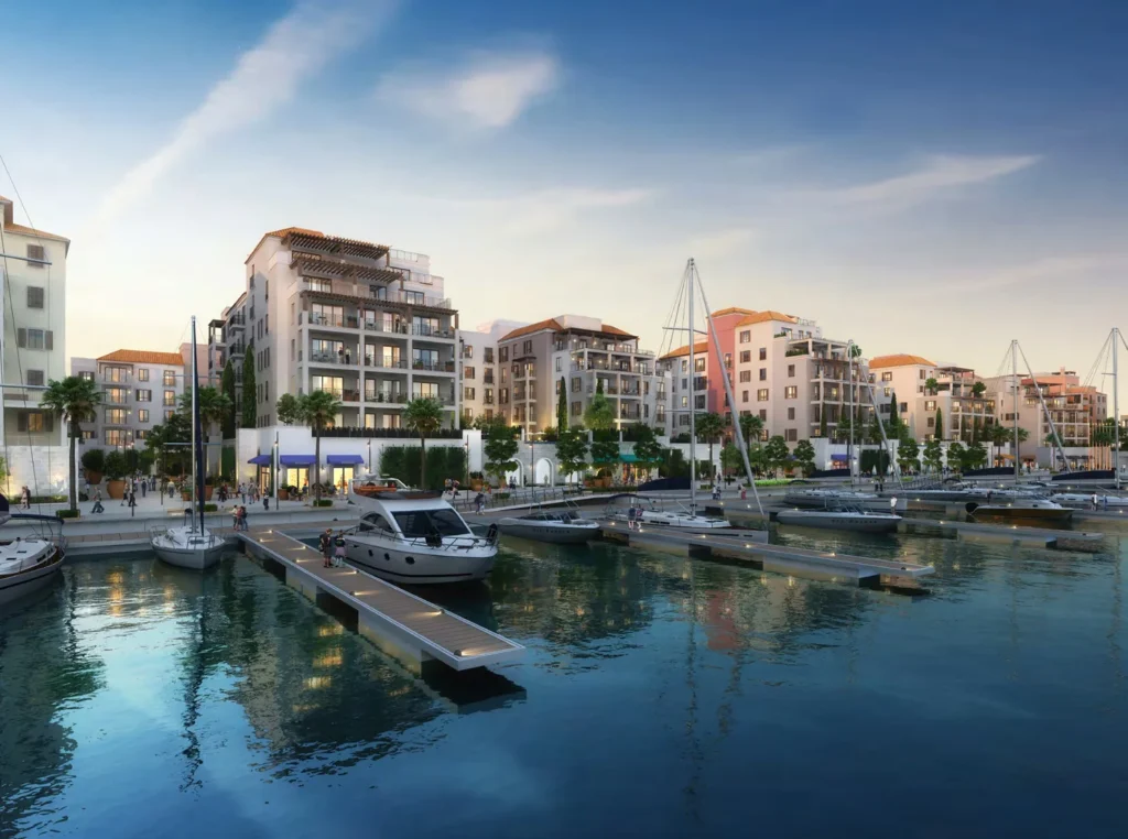 La Rive buildings and yachts moored at floating docks in the marina (developer rendering)