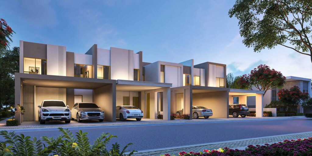 Row of modern two-story townhouses with carports and parked cars