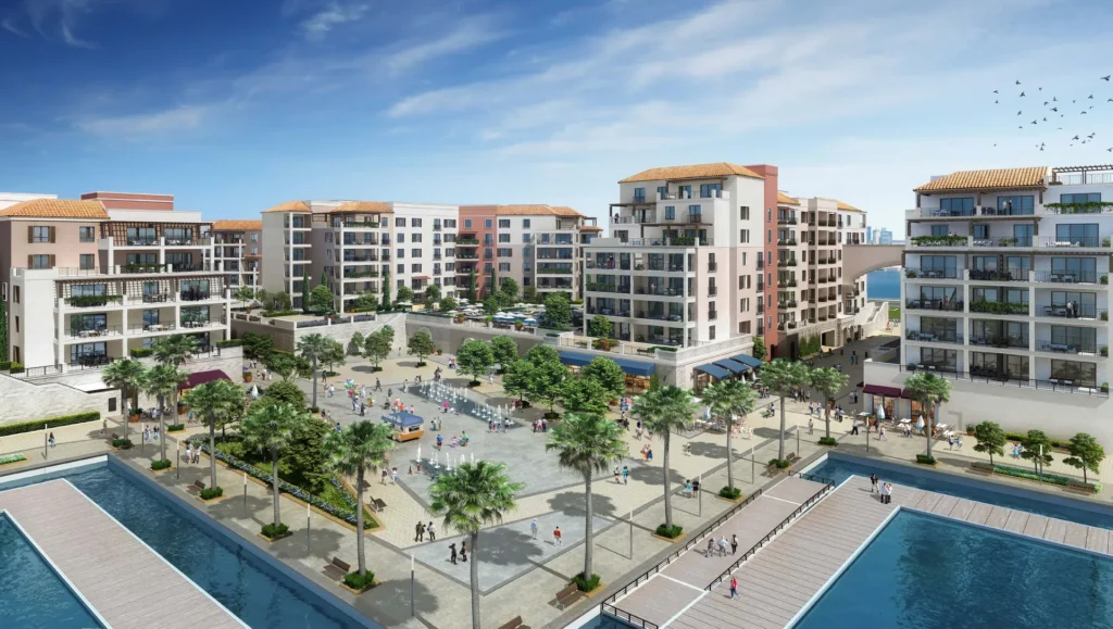 Aerial view of the pedestrian plaza and canals between La Voile buildings and the marina (developer rendering)