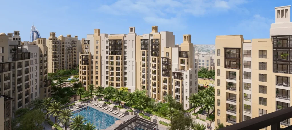 Lamaa Mjl by Meraas in Madinat Jumeirah Living, Dubai — Bird's-eye view of residential buildings surrounding landscaped pool