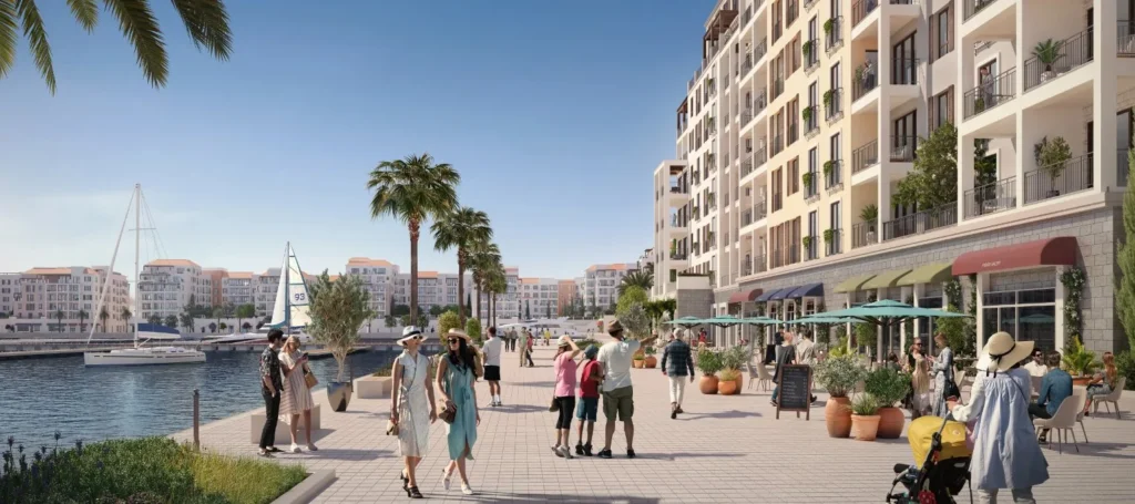 Pedestrian promenade with cafe terraces beneath Le Soleil apartment buildings (developer rendering)