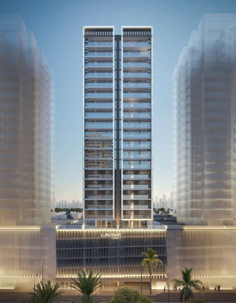 Exterior render of a tall residential tower with adjacent buildings