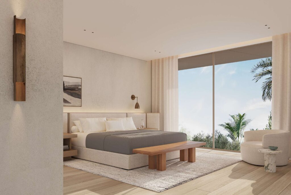Master bedroom interior with large window and garden view