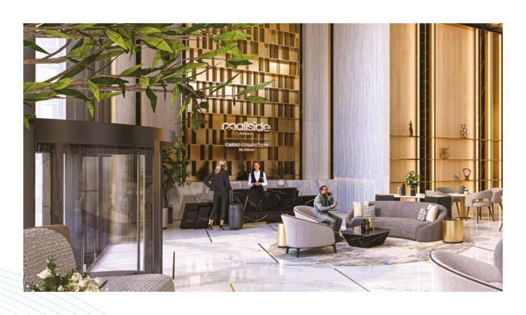 Hotel lobby interior with seating area and reception desk