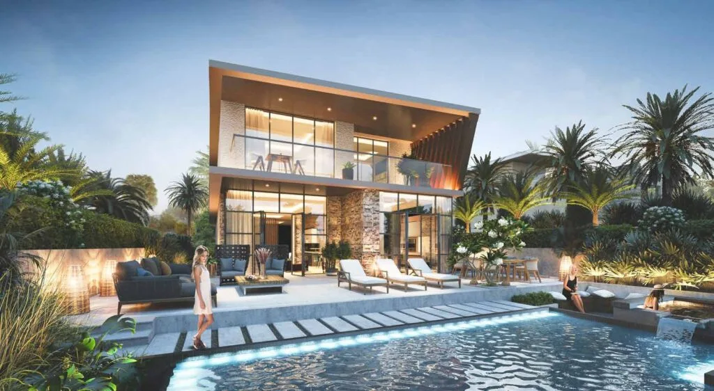 Exterior view of modern villa with pool and garden at dusk