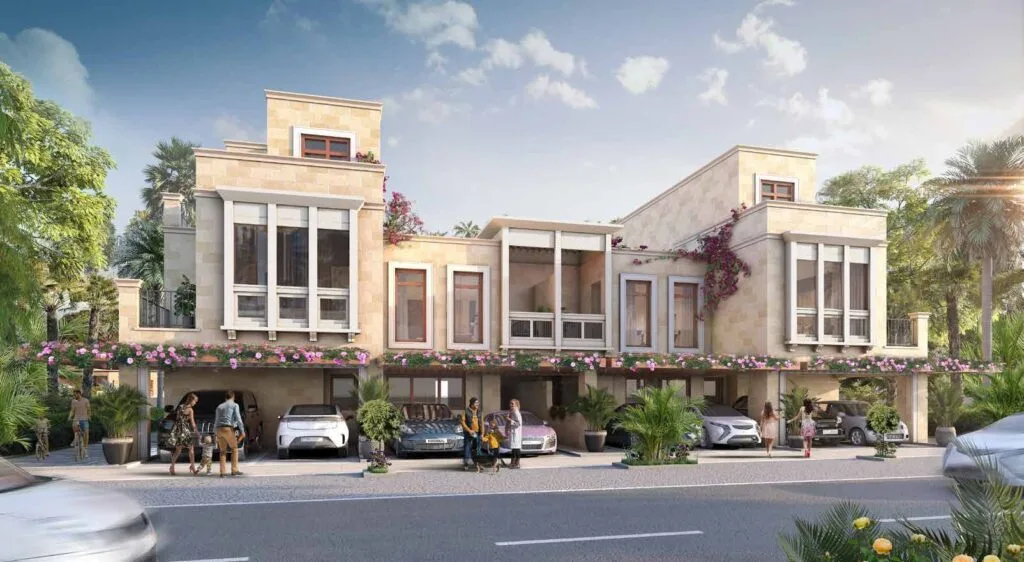 Exterior view of a row of modern townhouses with cars parked