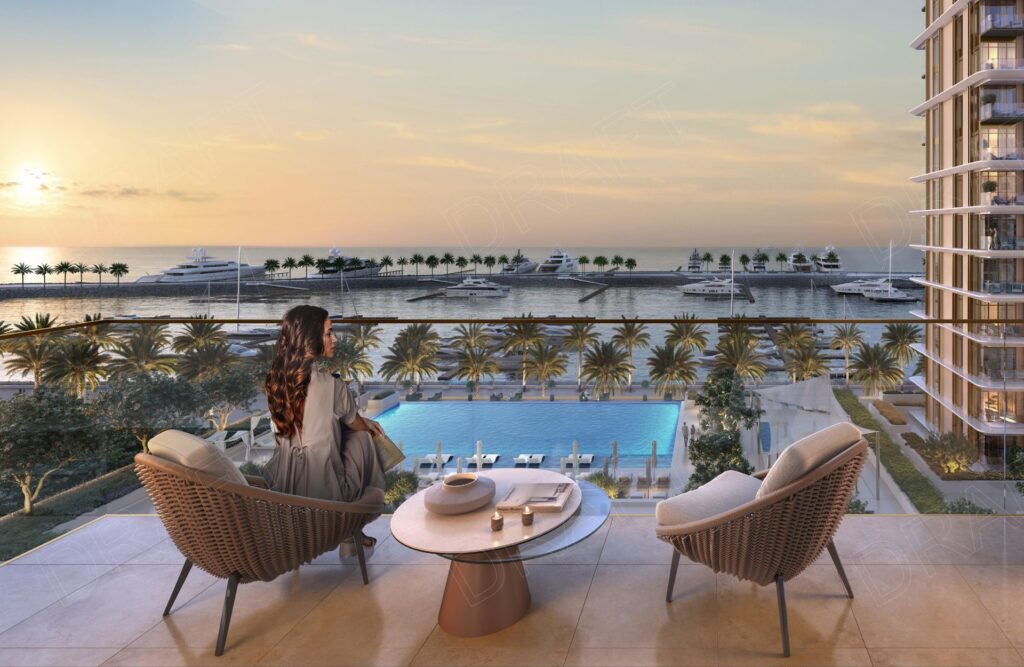 Balcony view overlooking pool, palm trees, marina, and yachts