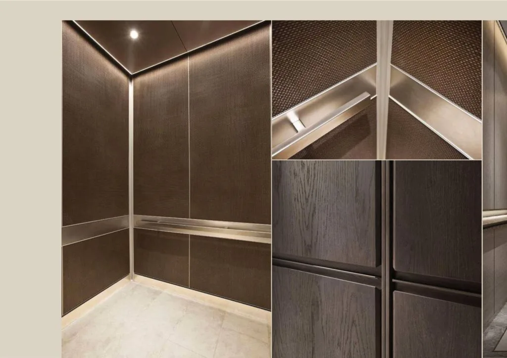 interior of elevator with brown textured walls and metal handrails